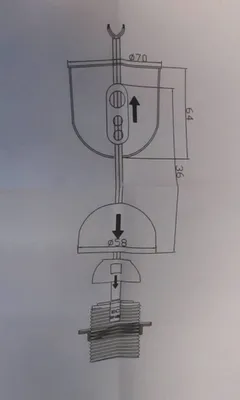 A technical drawing or diagram of a light fixture with dimensions and directional arrows.