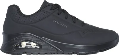 A side view of a black Skechers sneaker.