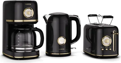 A set of three retro-style kitchen appliances: a coffee maker, a kettle, and a toaster, all in black with gold accents, displayed against a white background.