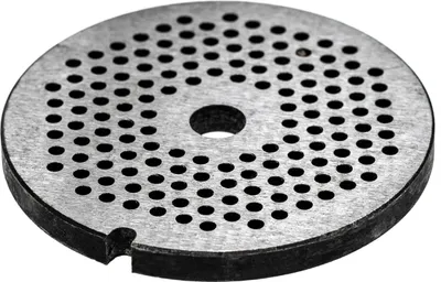 A close-up, isolated shot of a metal grinding plate with many small holes.