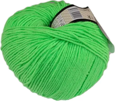 A ball of bright green yarn with a label attached.