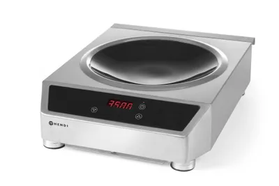 A professional studio shot of an induction wok cooker.