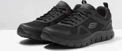 A pair of black Skechers sneakers on a white background.