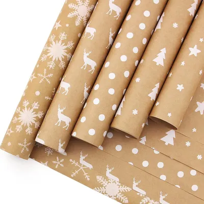 Productafbeelding van Bruin kraft cadeaupapier, 5 rollen, 44 cm x 3 meter, met kerstmotieven