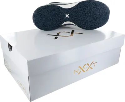 A shoe box with a shoe sole resting on top.