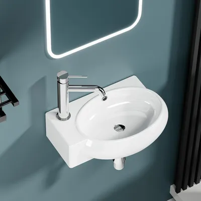 Immagine prodotto di Lavabo da parete con vasca ovale e sistema di troppo pieno