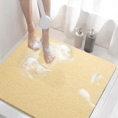 Obrázok produktu pre Protisklzová podložka pod sprchu, 60x60 cm, béžová, vyrobená z PVC s textúrou podobnou ľufu, s odtokovými otvormi, rýchlo schnúca