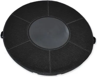 A circular black activated carbon filter with a transparent central section.
