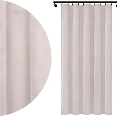 A close-up view of a cream-colored velour curtain and a full view of the curtain hanging from a rod.