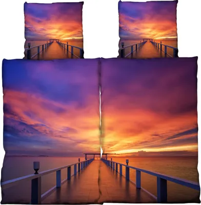 A bedding set featuring a sunset over a pier.