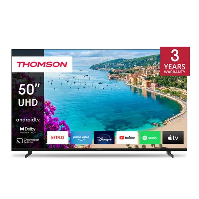 A Thomson 50-inch UHD Android TV displaying a scenic coastal town.