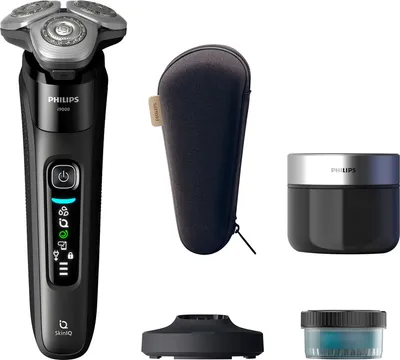 A collection of grooming products, including a shaver, travel case, and cleaning accessories, arranged on a white background.