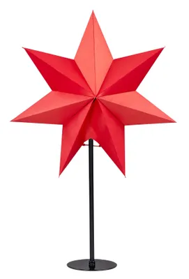 A red star decoration on a stand.
