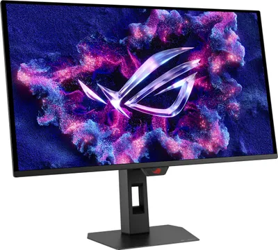 A computer monitor with a vibrant, abstract wallpaper displayed on its screen.