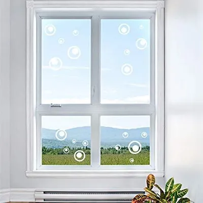 Produktbild von Vogelschutz und Fensterschutz, 20 Aufkleber in Retro-Kreis-Design zur Vermeidung von Vogelschlag, weiß