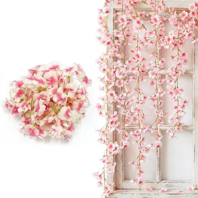 Productafbeelding van Twee kunstbloemenguirlanden, elk 180 cm lang, met kersenbloesemdecoratie, in roze zijde