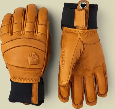 A pair of brown leather gloves with black cuffs, shown against a light gray background.