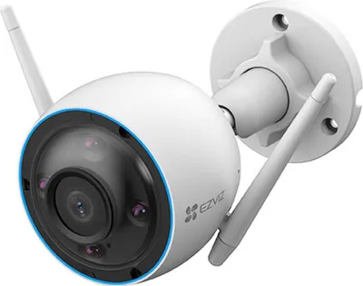 A white outdoor security camera with two antennas is mounted on a white bracket against a white background.