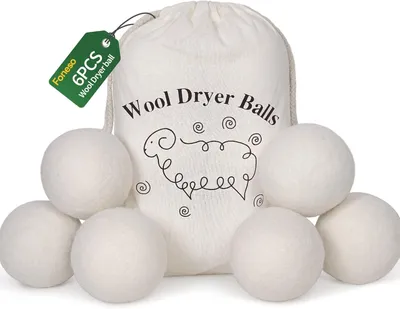Imagen del producto de 6 bolas secadoras XXL hechas de lana de oveja neozelandesa 100%, reutilizables, para ropa