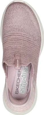 A top-down view of a pink slip-on shoe.