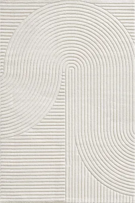 A close-up, top-down view of a rug with a geometric pattern.