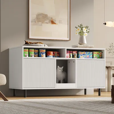 A white sideboard with open shelves and a hidden compartment for a litter box, styled in a modern living room setting.