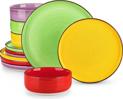 A colorful set of ceramic dishes including plates and bowls, arranged in a visually appealing manner.