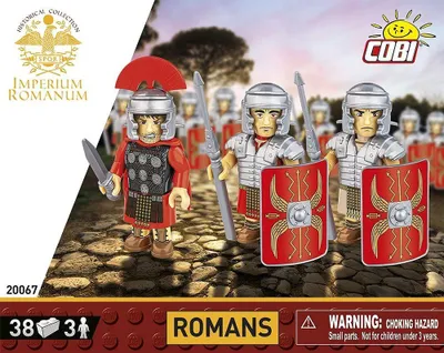 A group of toy Roman soldiers standing on a cobblestone path with a sunset sky in the background.