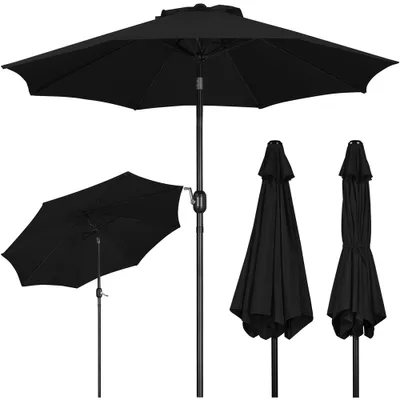 A studio shot of black umbrellas on a white background.