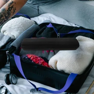 Imagen del producto de Bolsa de EVA negra para rizadores y planchas de pelo, organizador portátil para herramientas de estilismo capilar, resistente a golpes, ideal para viajes y uso diario