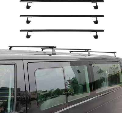 Three black roof racks are shown above a dark-colored van.