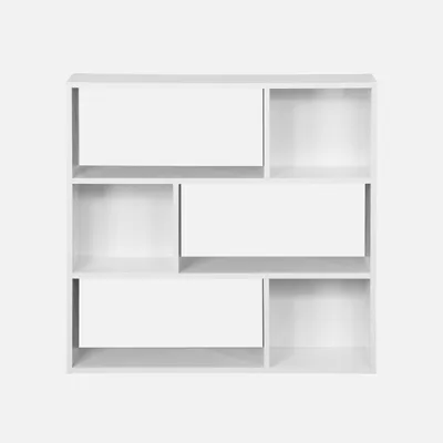 A white, multi-compartment bookshelf against a plain white background.