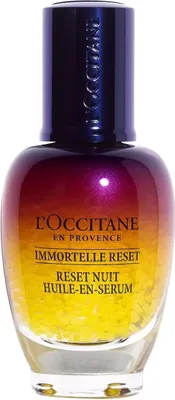 A product shot of a bottle of L'Occitane Immortelle Reset serum.