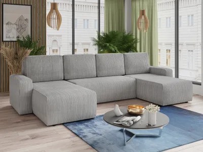 A modern living room with a large U-shaped sectional sofa.