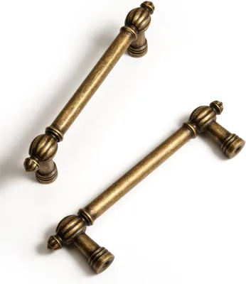 Immagine prodotto di Maniglia per mobili, 96 mm, lega di zinco, finitura ottone anticato, per cucina