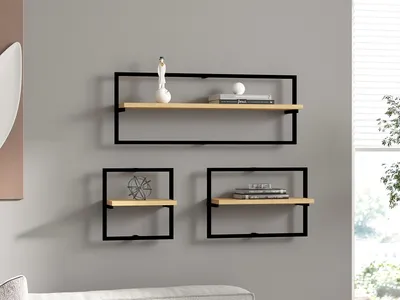 Three modern wall shelves with black metal frames and light wood shelves are mounted on a gray wall.
