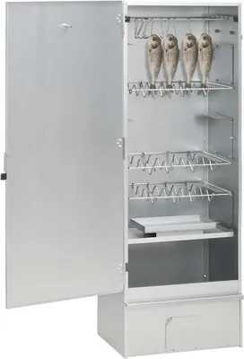 An open, silver metal smoker with fish hanging inside.
