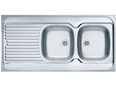 A top-down view of a double-basin stainless steel sink with a draining board.