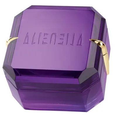 A purple, faceted perfume bottle with gold accents and embossed text on the lid.