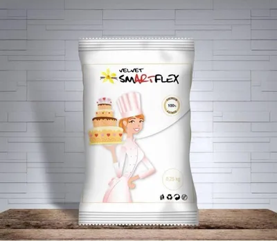 A bag of SmartFlex fondant with an illustration of a baker holding a cake.