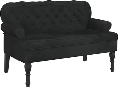 A black velvet sofa with tufted back and rolled arms, shown from a front-side angle against a white background.