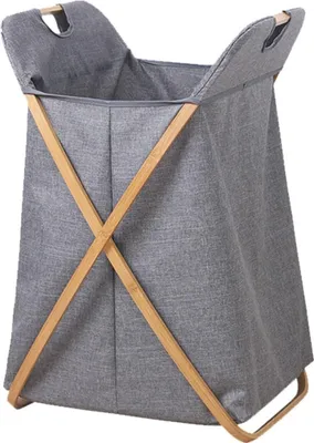 A grey fabric laundry basket with a wooden frame.
