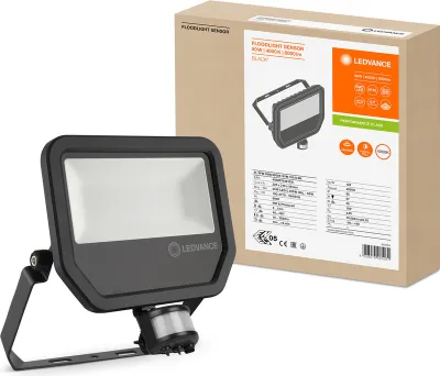 A floodlight and its packaging are shown together.