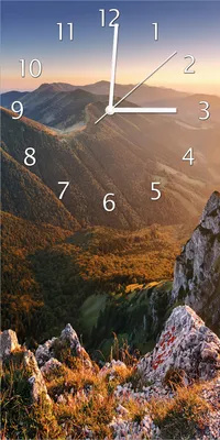 Produktbild von Wallario Design Wanduhr bedruckt, Größe 30 x 60 cm, Motiv: Berglandschaft mit Sonnenuntergang in der Slowakei