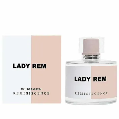 A perfume bottle and its box are displayed side-by-side against a white background.