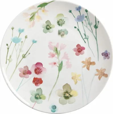 A white plate with a watercolor floral pattern.