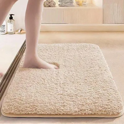 Produktbild von Unyqoos® Badematte 40 x 60 cm – saugfähige, hautfreundliche Badezimmermatte, maschinenwaschbar mit rutschfester Gummirückseite, beige