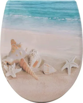 A toilet seat lid with a beach and seashell design.