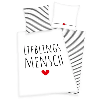 A flat lay of bedding with text and a heart graphic.