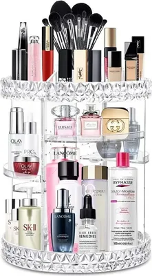 A rotating makeup organizer filled with various cosmetic products.